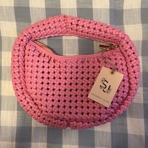 Pink knotted purse